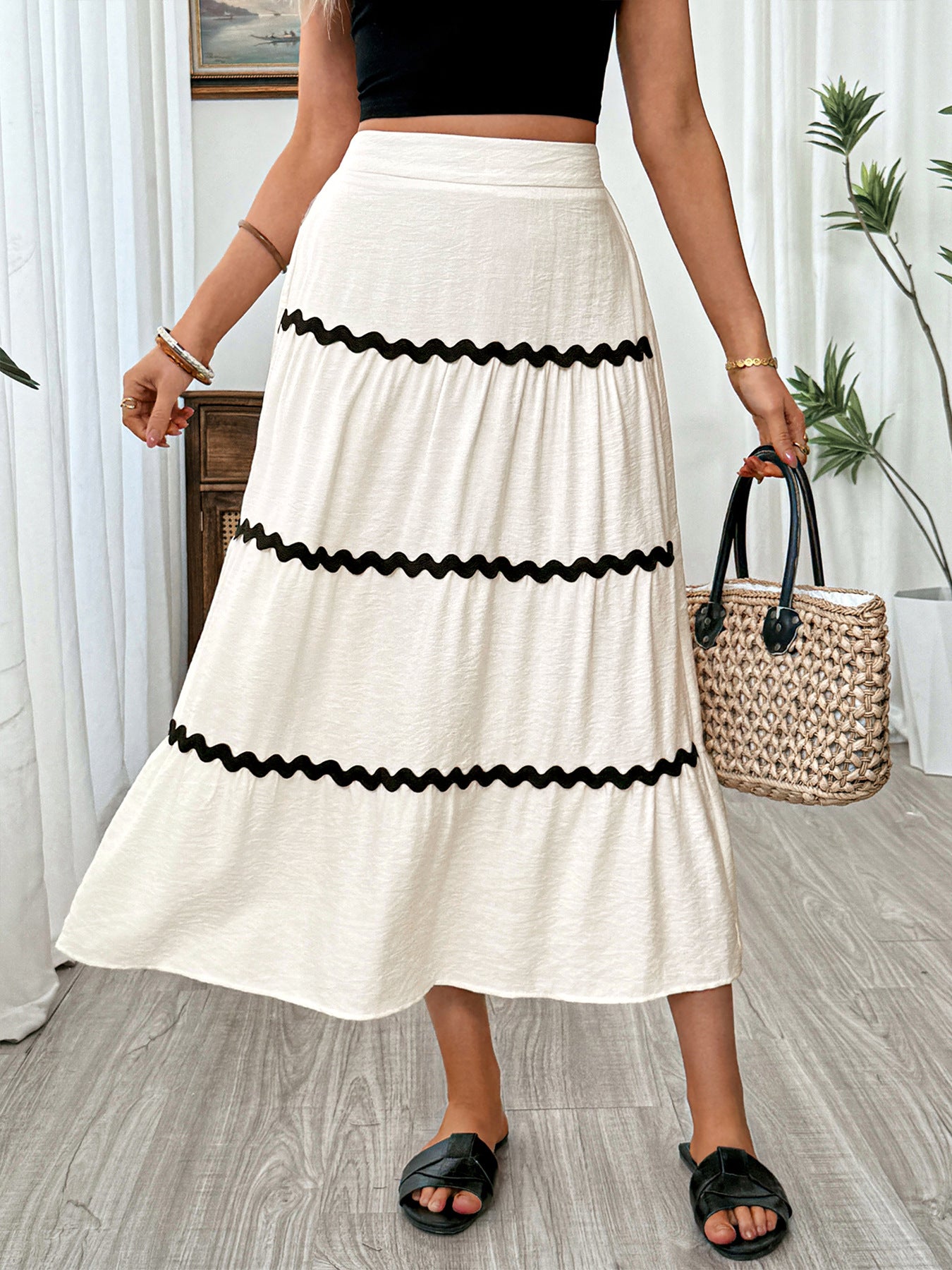 iered Flowy Midi Skirt in Beige – front view, ruched tiered midi length