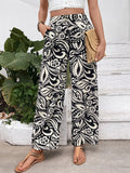 Buttoned Wide Leg Pants in Black – front view, button-front closure with deep side pockets