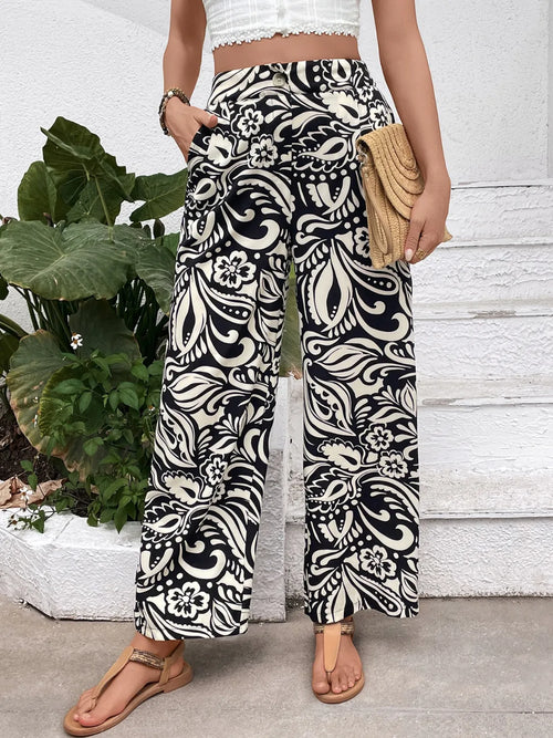 Buttoned Wide Leg Pants in Black – front view, button-front closure with deep side pockets