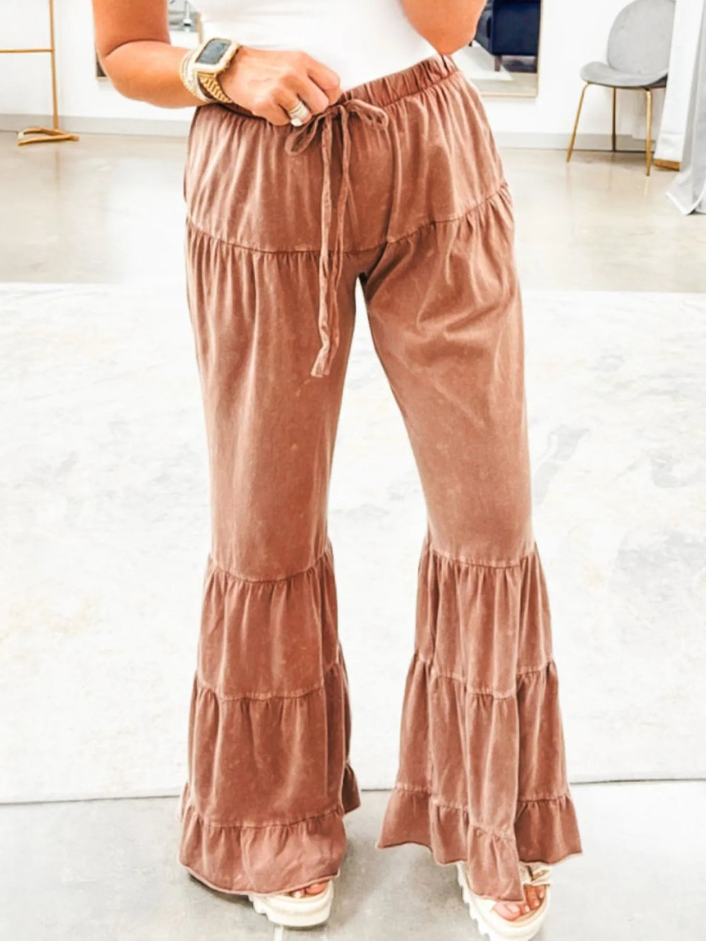 Ruffle flare pants women caramel drawstring waist wide leg ruffle hem front view