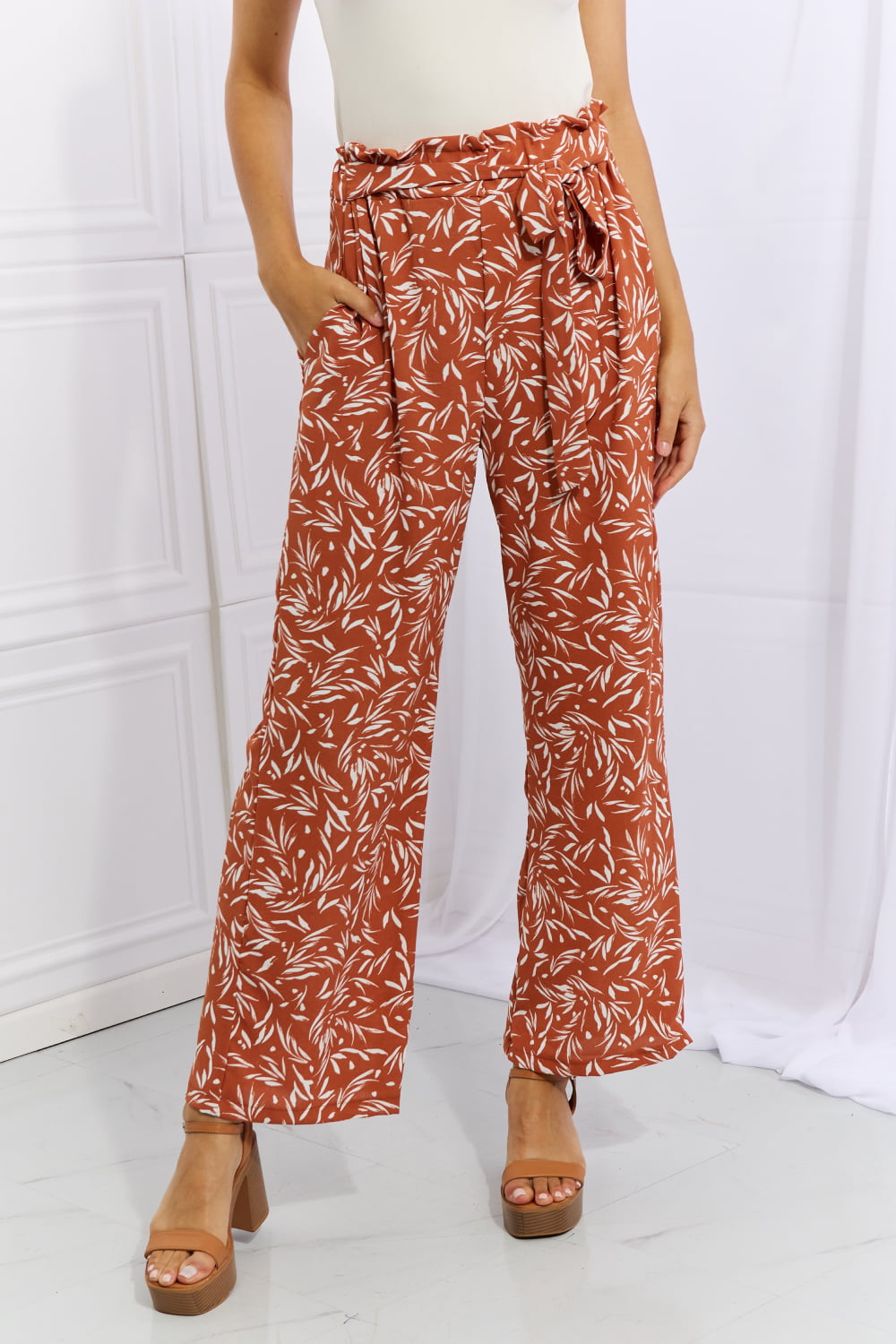 Geometric Print Paperbag Pants in Orange-Red – front view, tie waist wide-leg silhouette