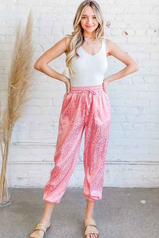 Satin leopard print joggers women pink luxe drawstring lounge pants front view