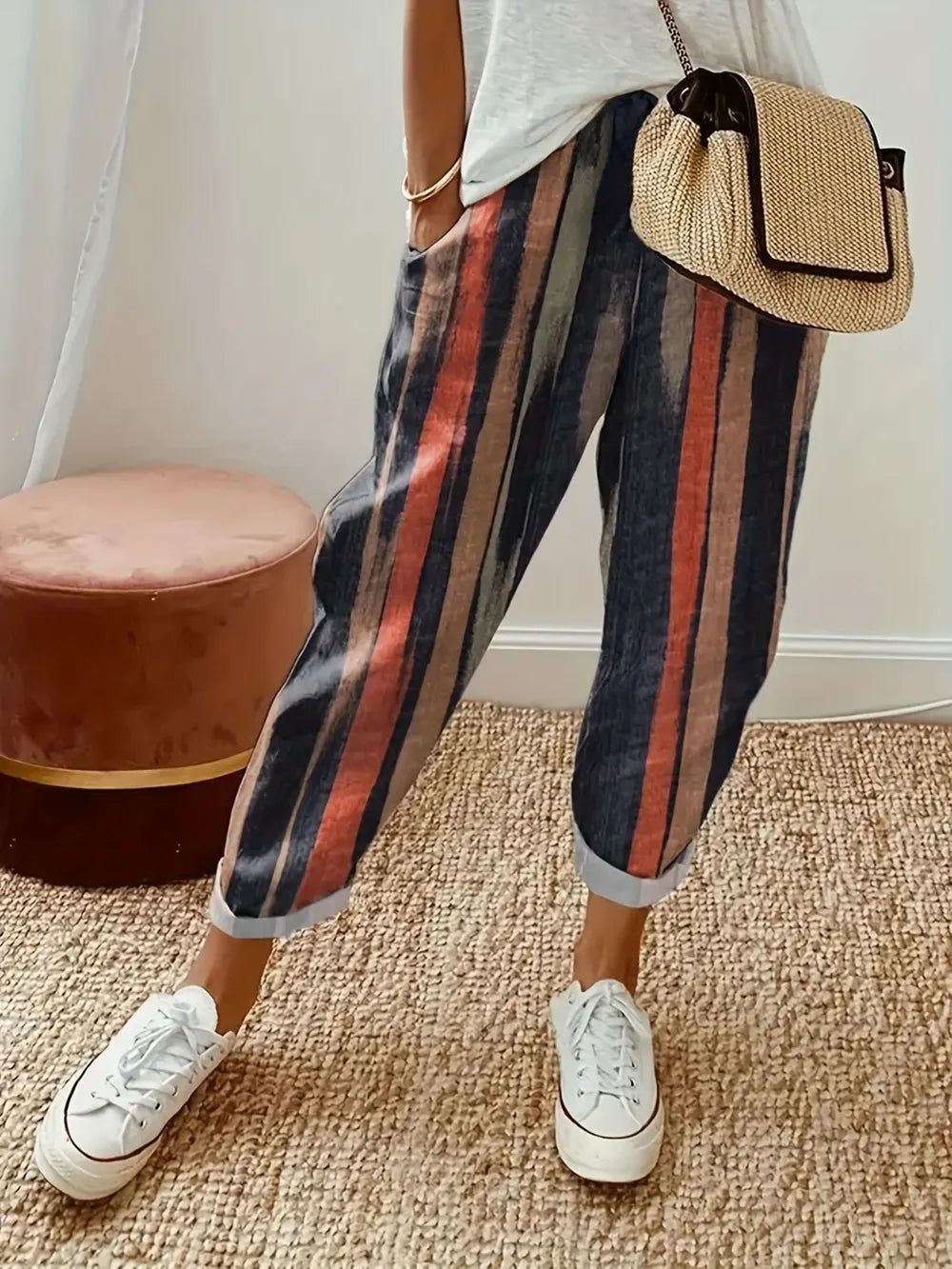 Striped elastic waist pants women black relaxed fit pocketed trousers front view